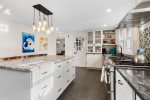 Perfect entertaining kitchen with lots of surfaces and cooking utensils 